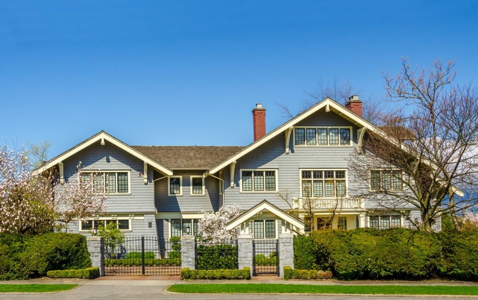 Large Blue House with Gated Entrance